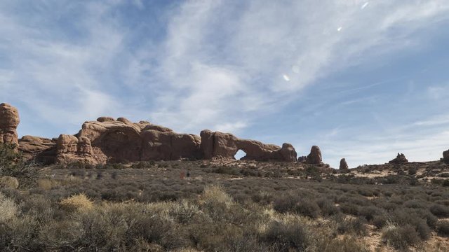 A wide timelapse of the Windows section of Arches National Park on a winter morning.