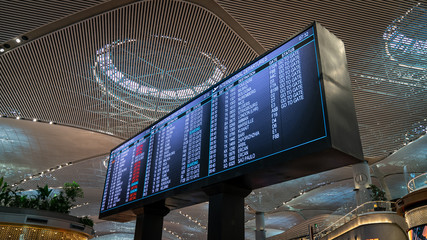 Istanbul, Turkey - May 2019: Flight information display in new Istanbul Airport displaying the upcoming flights