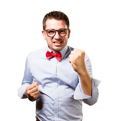 Man wearing a red bow tie. Looking upset.