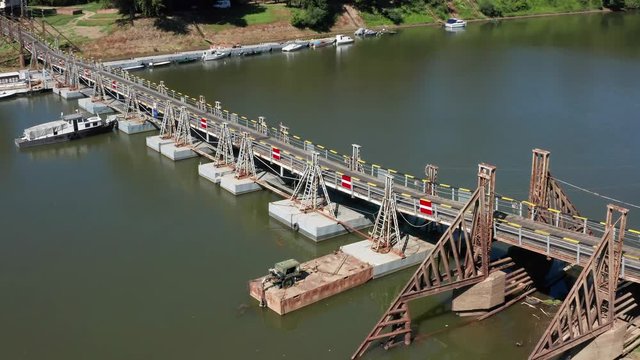 Pontoon wooden bridge over the Tisza river, aerial shot in summer Csongrad, Hungary.