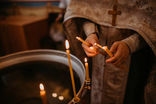 burning candles in a church