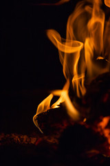 interesting shapes of fire tongues on black background
