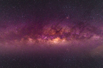 Night scenery with colorful and light yellow Milky Way Full of stars in the sky in summer Beautiful...