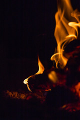 interesting shapes of fire tongues on black background