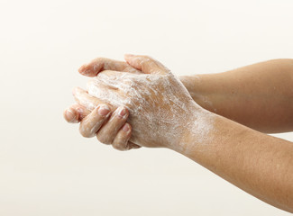 hands with soap foam