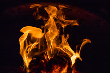 Fiery figures. Fire flames on black background