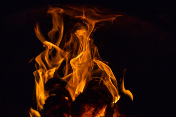 Fiery figures. Fire flames on black background