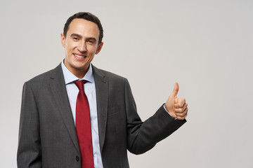 business man showing thumbs up