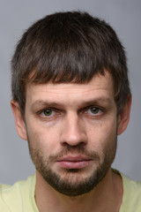 Fototapeta premium Closeup portrait of an upset crying man of European appearance