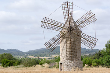 Fototapeta na wymiar Old, Restored Windmill in Countryside in Majorca, Spain