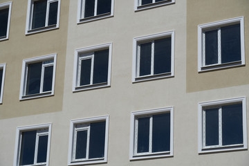 facade of a new multi-storey building with many windows