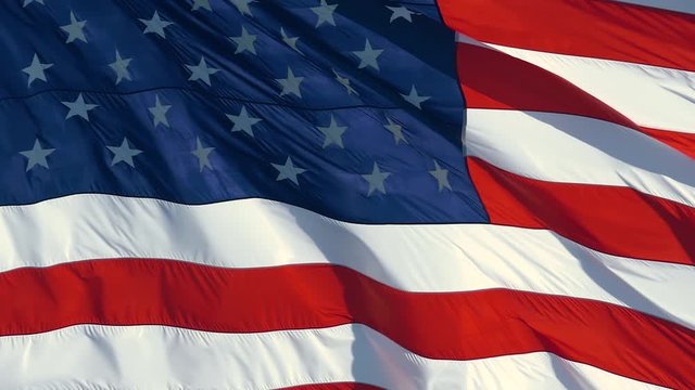 AMERICAN FLAG BACKGROUND, SUPER SLOW MOTION: American flag USA Close Up waving background texture. American Flag Waving Slow Motion. Beautifully waving star and striped American flag