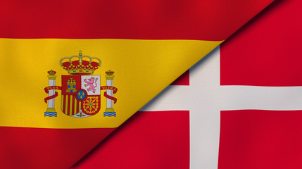 The flags of Spain and Denmark. News, reportage, business background. 3d illustration