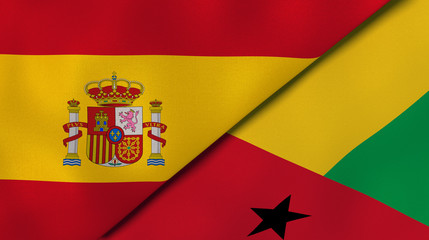 The flags of Spain and Guinea Bissau. News, reportage, business background. 3d illustration