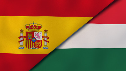 The flags of Spain and Hungary. News, reportage, business background. 3d illustration
