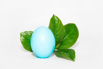 festive Easter egg light blue and green leaves
