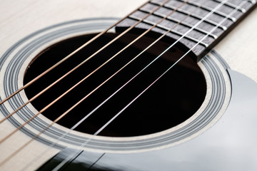 Obraz premium Hobbies and vacations by playing acoustic guitar