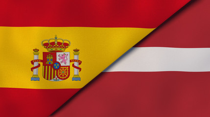 The flags of Spain and Latvia. News, reportage, business background. 3d illustration