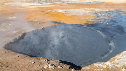 Hverir Myvatn geothermal area with natural steam vents and mud pools all around Lake Myvatn, the...