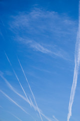 Aeroplane vapor trails in jet stream from jet aircraft.