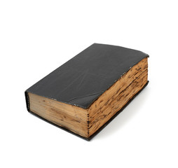 closed very old book with yellow sheets and a black cover isolated on white background