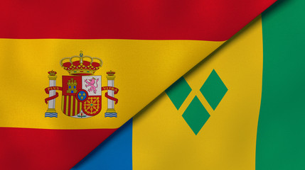 The flags of Spain and Saint Vincent and Grenadines. News, reportage, business background. 3d illustration