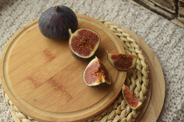 Fototapeta na wymiar figs on a wooden table