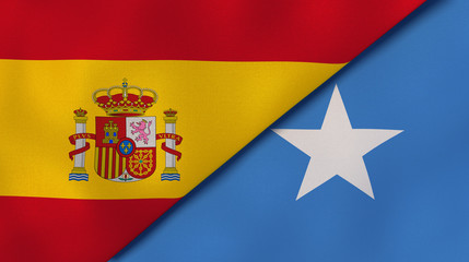 The flags of Spain and Somalia. News, reportage, business background. 3d illustration