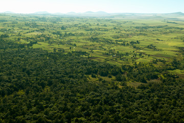 Fototapeta na wymiar Aerials of Lewa Conservancy showing fence line of protected areas and encroaching farming in Kenya, Africa
