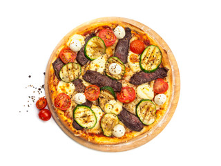 Pizza with beef, grilled zucchini, cherry tomatoes and mozarella cheese on wooden platter isolated on white