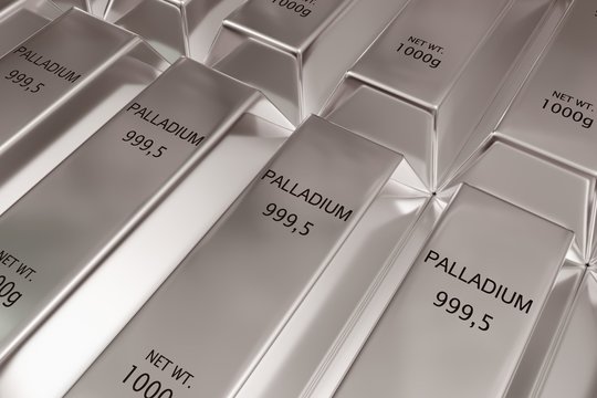 Stacked rows of shiny palladium ingots or bars background - precious metal or money investment concept