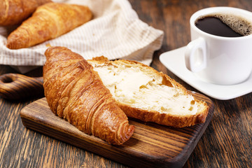 Fresh croissants with butter