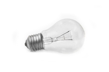 old light bulb 100w on a white background. consumes a lot of energy. not economical