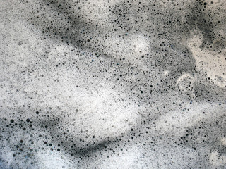 bubble foam shampoo and water drops background