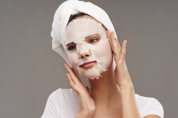 young woman with facial mask