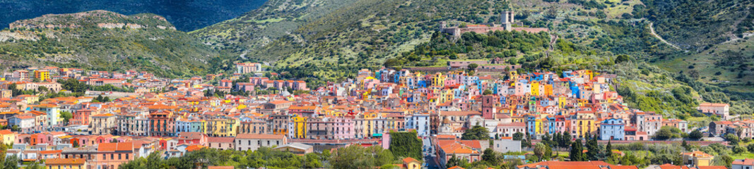 Fototapeta na wymiar Wonderful morning panorama of colourful houses of old town Bosa in Sardinia