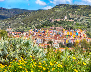 Wonderful morning panorama of colourful houses of old town Bosa in Sardinia