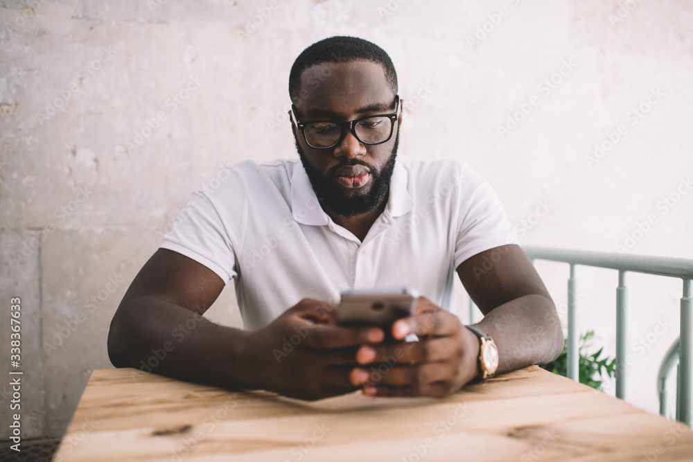 Poster black blogger in optical spectacles for eyes correction using 4g wireless for browsing informative s