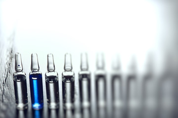 ampoules medicine vaccine concept, abstract background, vaccination virus protection
