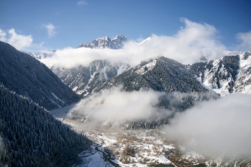 Snow Rocky Mountains at sunrise with Blue Sky in Kazakhstan 