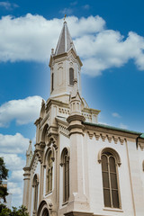Fototapeta na wymiar An old stone church in Savannah isolated on white background