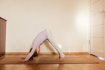 Little girl doing yoga