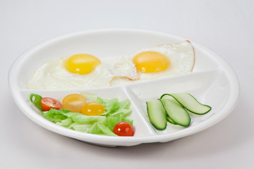 scrambled eggs in a Breakfast plate