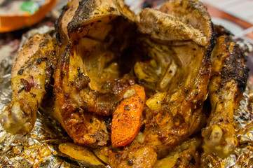 Grilled whole chicken close-up. Macro photo.