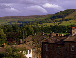 Fototapeta na wymiar Village and fields in the Yorkshire Dales