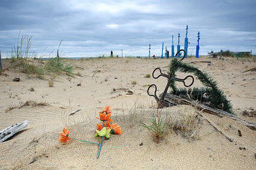 grave crosses in a desert cemetery / climate change concept warming, disaster, apocalypse,...