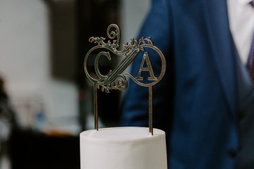 initials of the bride and groom on the cake
