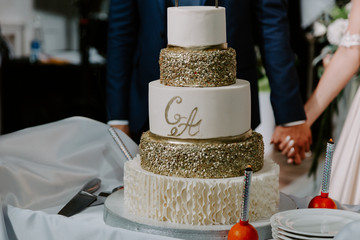 unusual wedding cake with gold elements