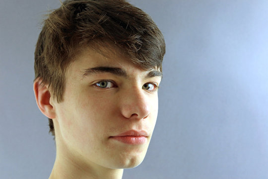 Portrait Of A Young Teenage Boy With Cleft Chin