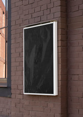 Blank black glass rectangular poster mock up brick wall mounted